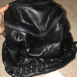 Slouchy black convertible backpack